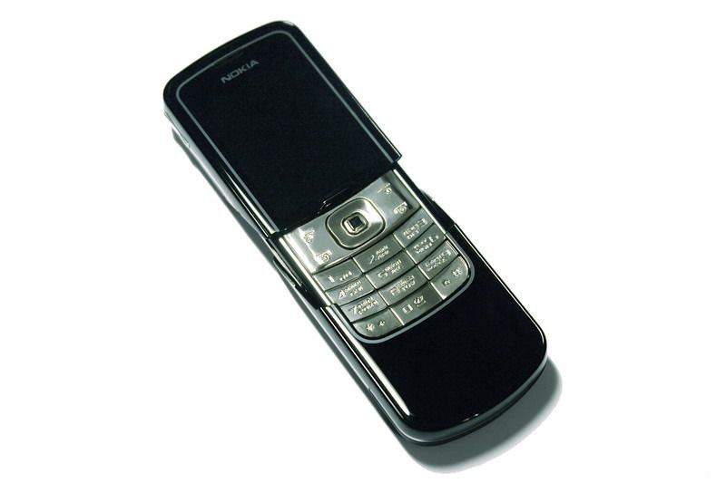 MJ - Nokia 8600 Luna White Gold. Inlaid Diamonds & Dark Blue Sapphire.